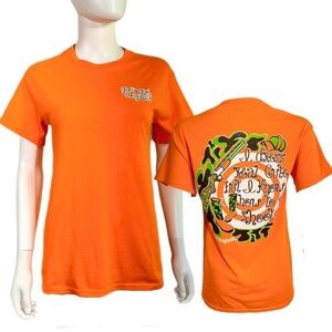 Girlie Girl Originals “I dress real cute but I know how to shoot” Orange Tee